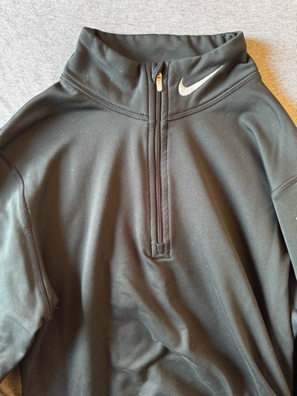 Nike Black Quarter-Zip Pullover with White Swoosh